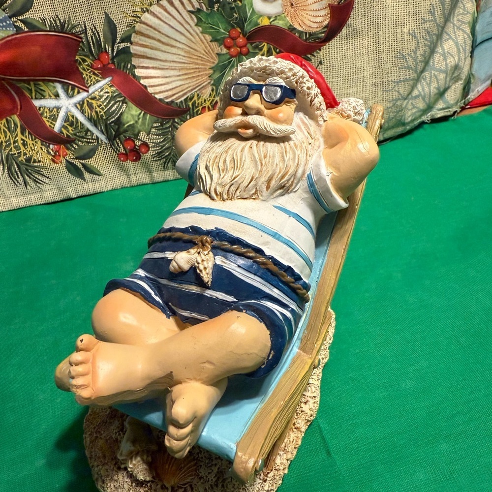 Relaxing Santa Figurine in Blue and White at Beach